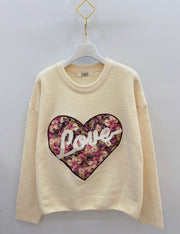 Pull cœur fleuri