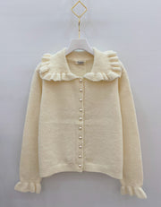 Gilet en maille à col volanté