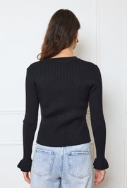 Gilet en maille à boutons dorés