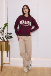 Pull maille rayé inscription bouclette