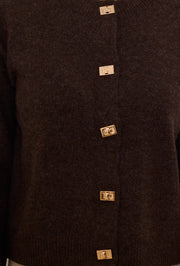 Gilet en maille à boutons dorés