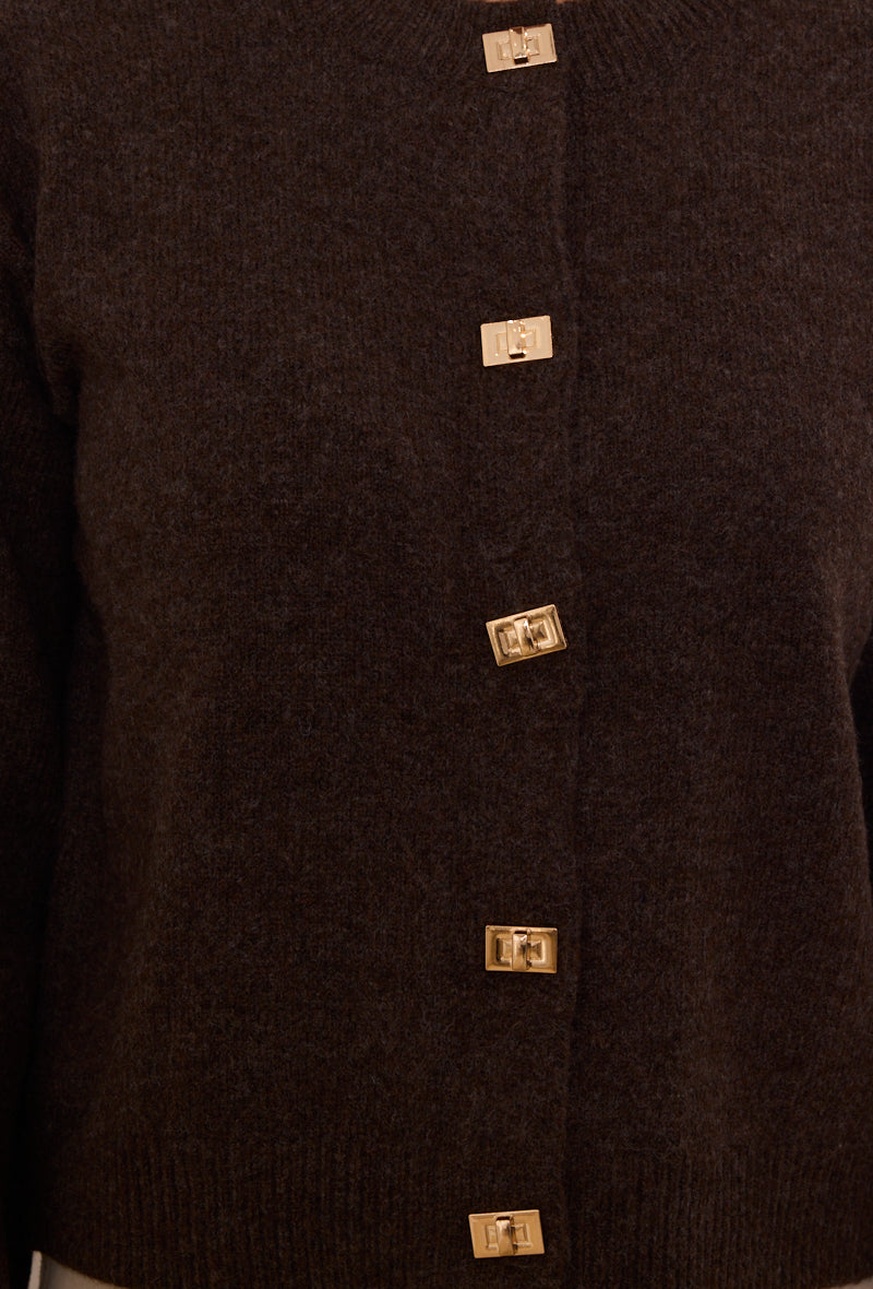 Gilet en maille à boutons dorés