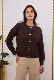 Gilet en maille à boutons dorés