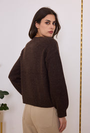 Gilet en maille à boutons dorés