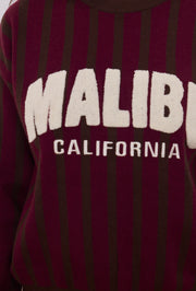 Pull maille rayé inscription bouclette