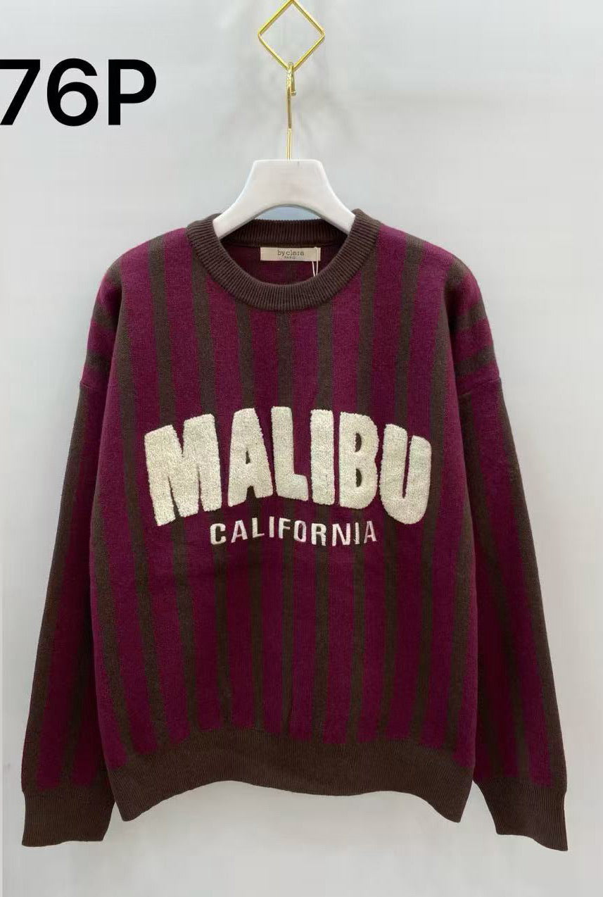 Pull maille rayé inscription bouclette
