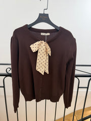 Gilet en maille à nœud fantaisie