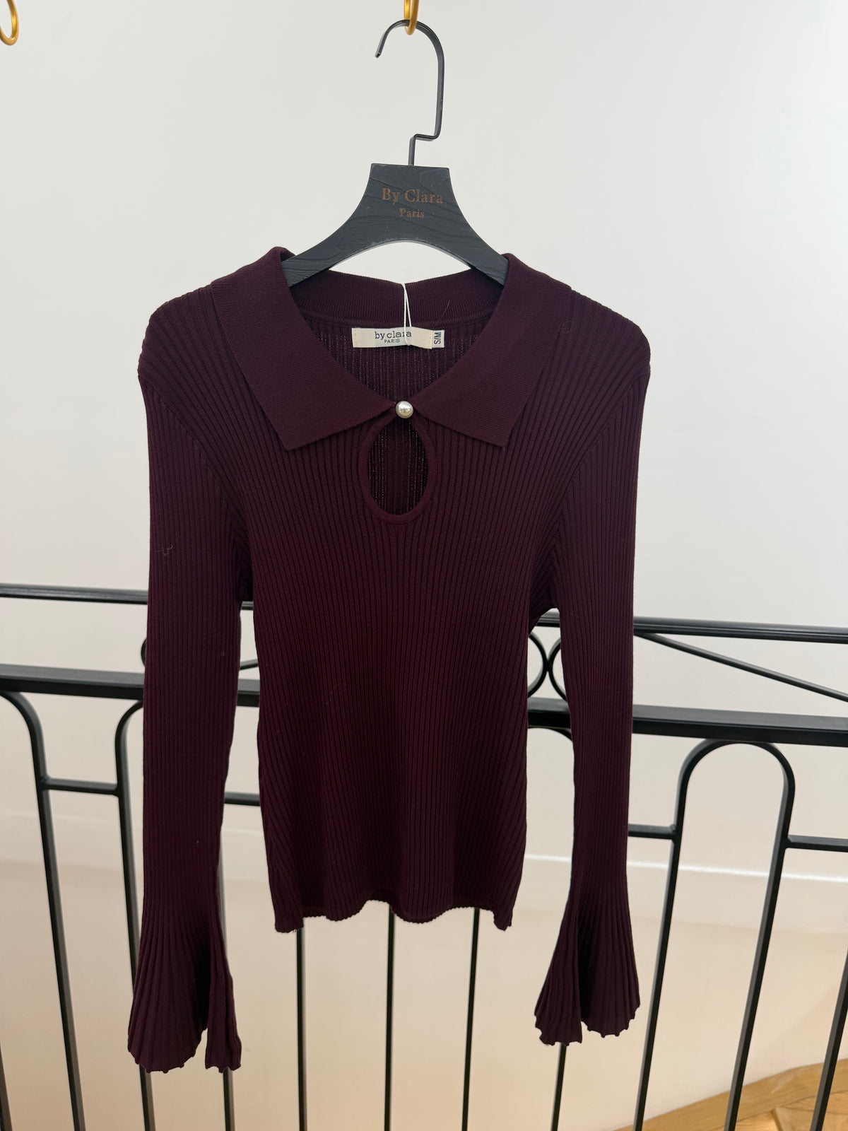 Pull col polo manches évasées