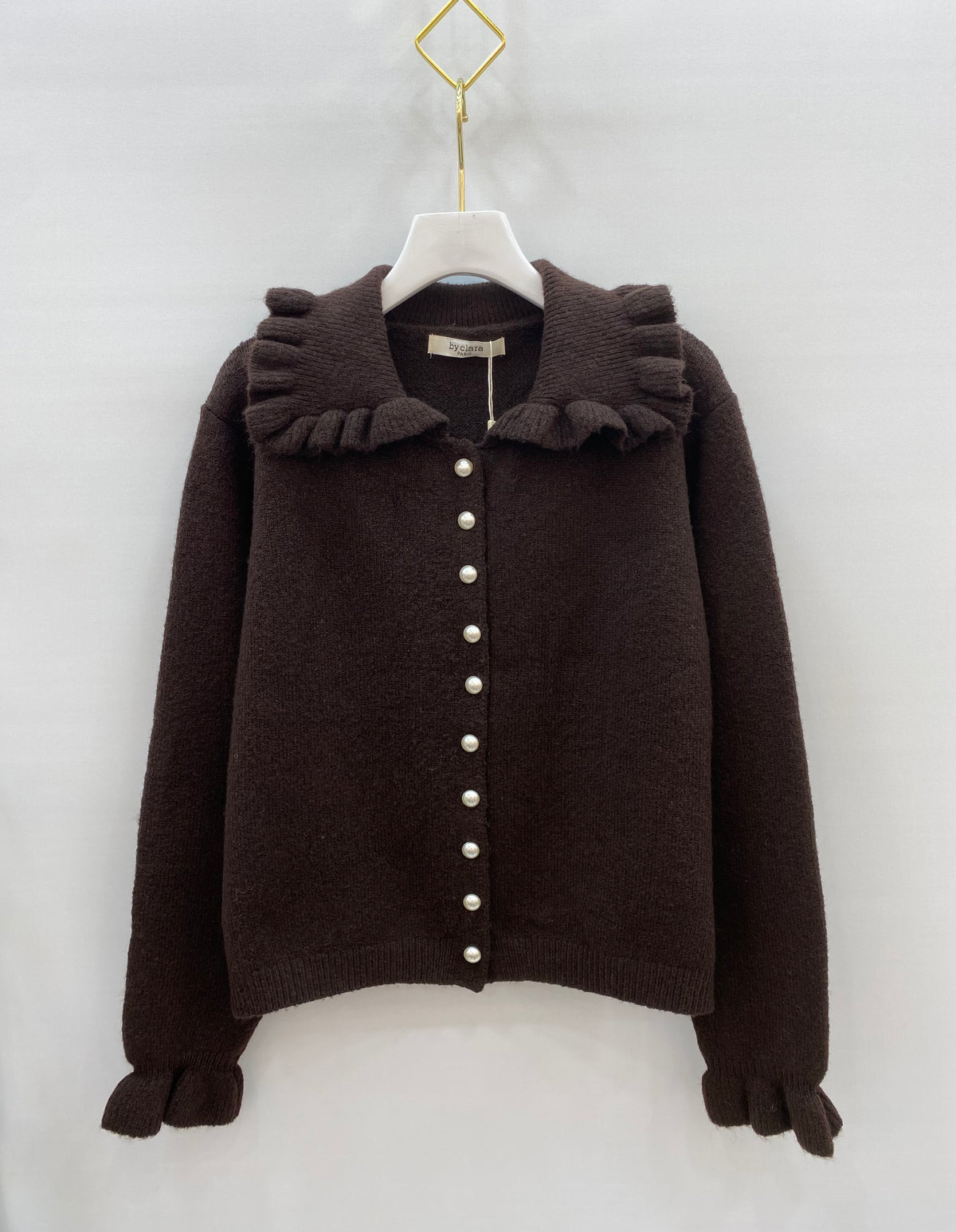 Gilet en maille à col volanté