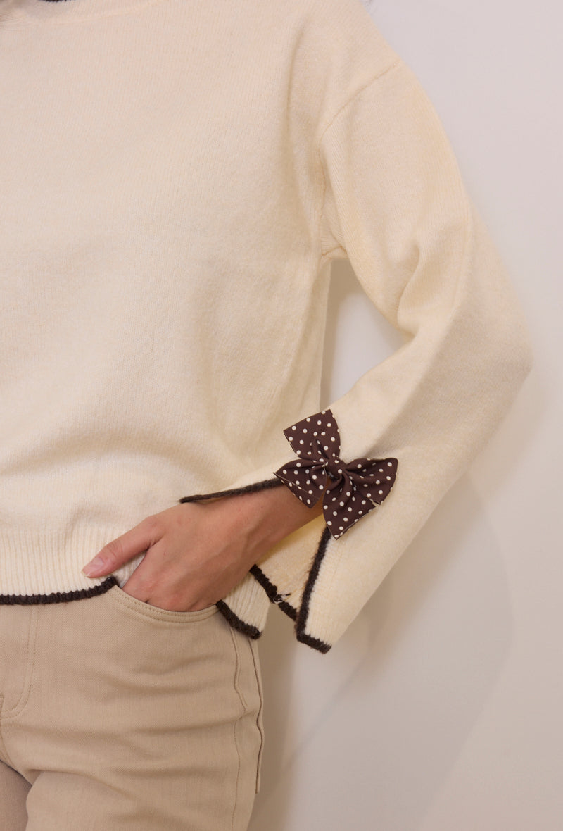 Pull maille nœuds pois