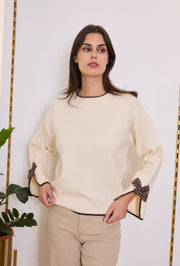 Pull maille nœuds pois