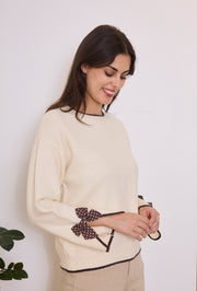 Pull maille nœuds pois