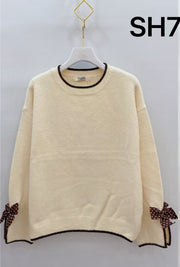 Pull maille nœuds pois