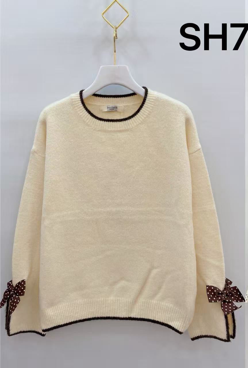 Pull maille nœuds pois