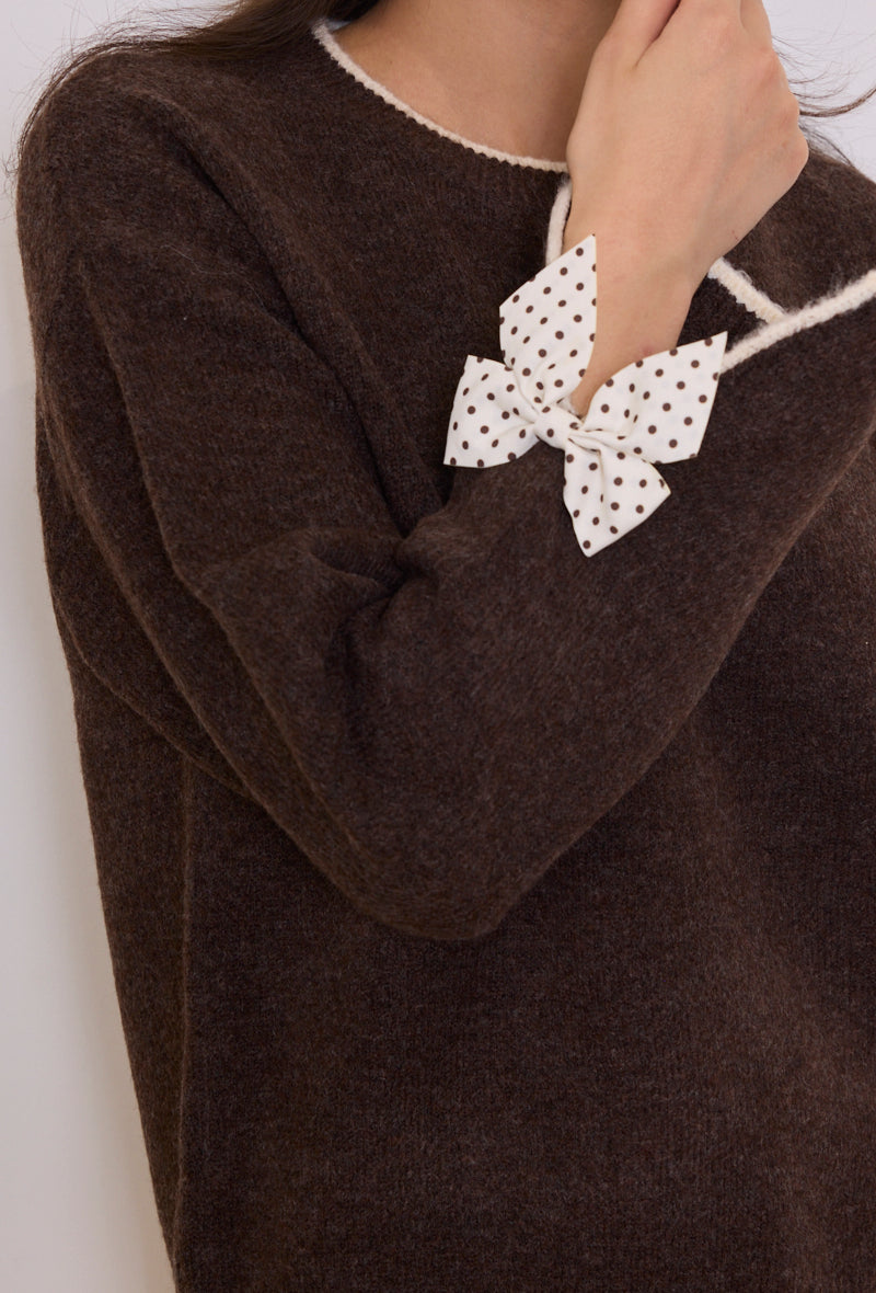 Pull maille nœuds pois