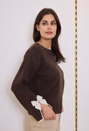 Pull maille nœuds pois
