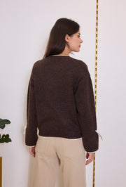 Pull maille nœuds pois