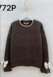 Pull maille nœuds pois