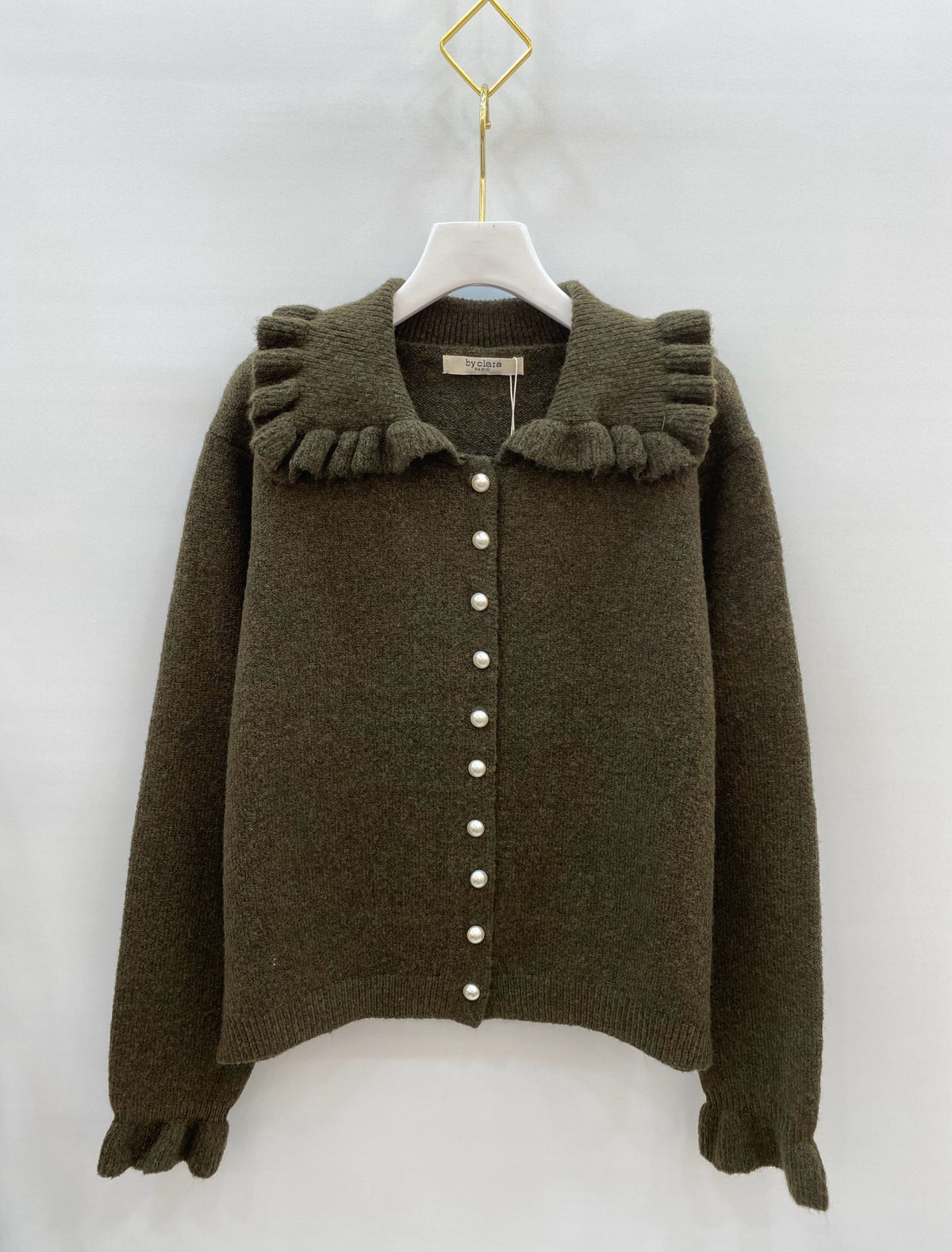 Gilet en maille à col volanté