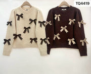 Pull maille nœuds fantaisie
