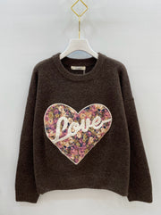 Pull cœur fleuri