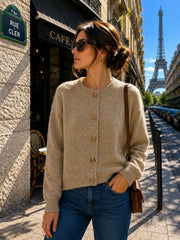 Gilet en maille à boutons dorés