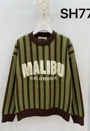 Pull maille rayé inscription bouclette