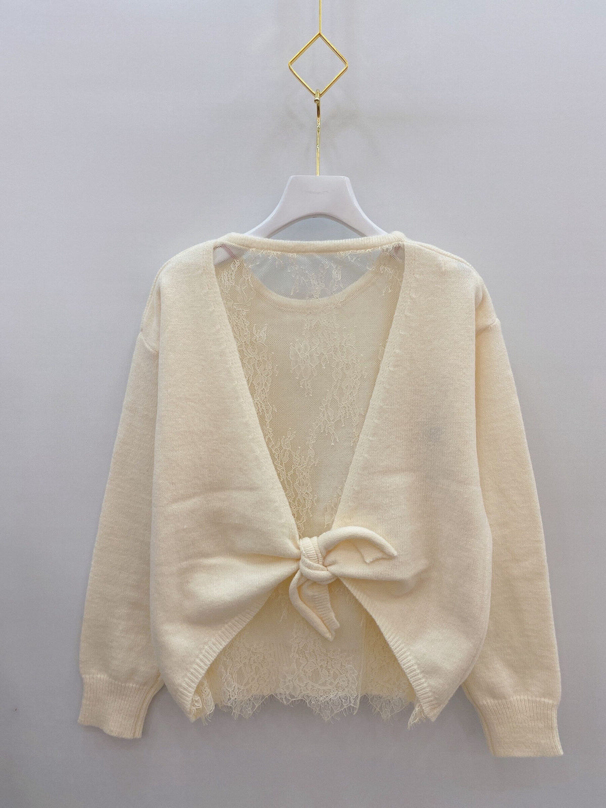 Pull maille réversible dos noué